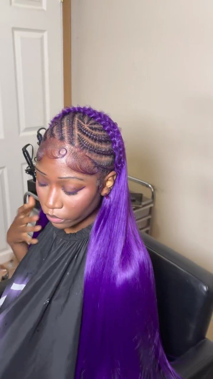 Woman with purple hair featuring precise stitch braids and a braided crown.