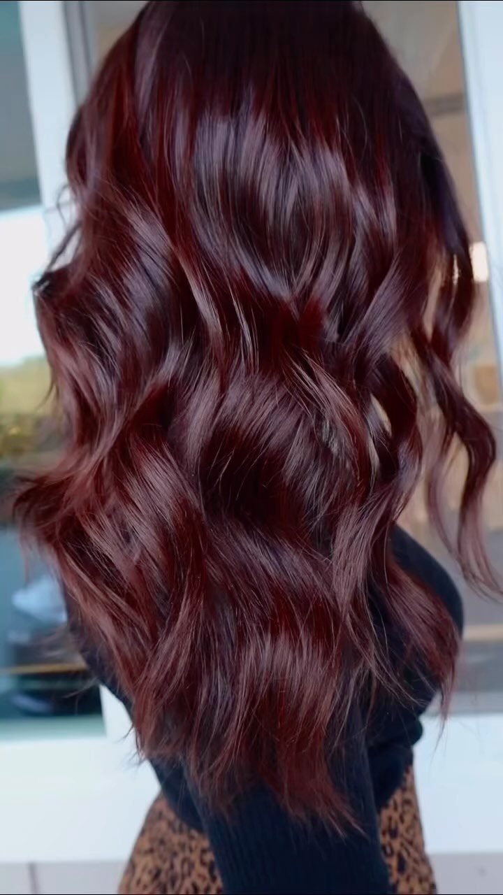 Fall Hairstyles and Color: 16 Ideas, Caramel to Espresso 9 Long wavy hair dyed in a deep chocolate cherry red-brown shade.