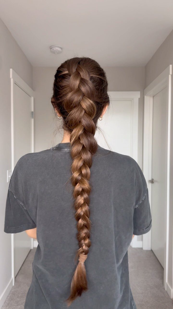 9 Long Hair Tutorial Ideas: Braids, Buns and Ponytails 2 Long brown hair styled in a thick Dutch braid from back view.