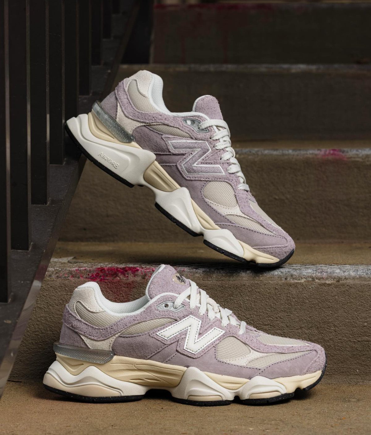 New Balance 9060 sneakers in truffle purple showing mesh and suede upper details.