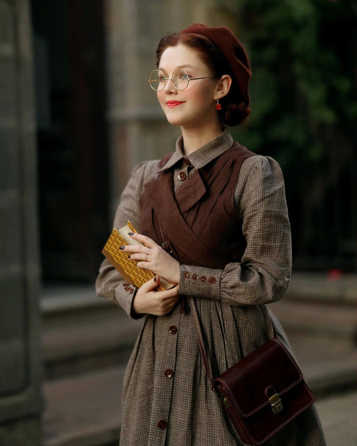 Period Piece Dresses: 5 Ideas, From Victorian to Steampunk 2 Woman in a brown checked dress and red beret holding a yellow book.