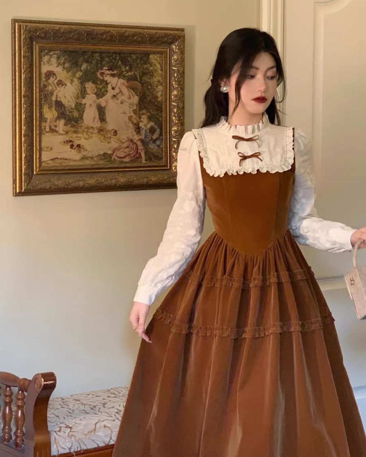 Period Piece Dresses: 5 Ideas, From Victorian to Steampunk 5 Woman wearing a brown vintage-inspired dress with a white ruffled blouse and lace.