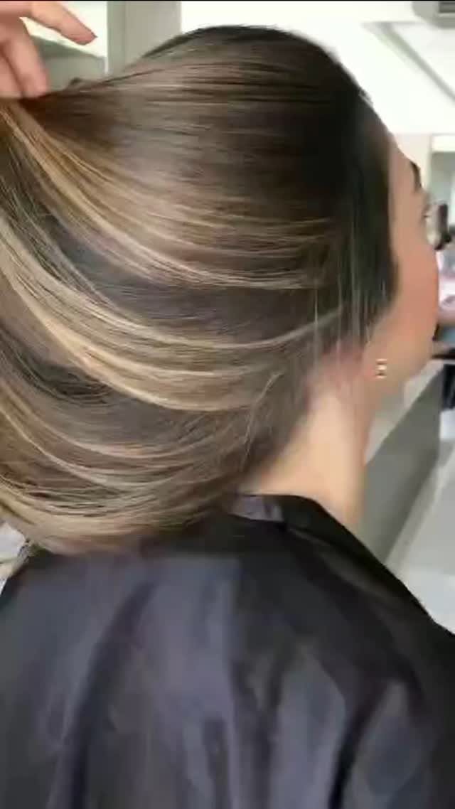 Types of Hair Colour: 12 Ideas, From Balayage to Copper 1 Long wavy brown hair with golden blonde balayage highlights in a salon setting