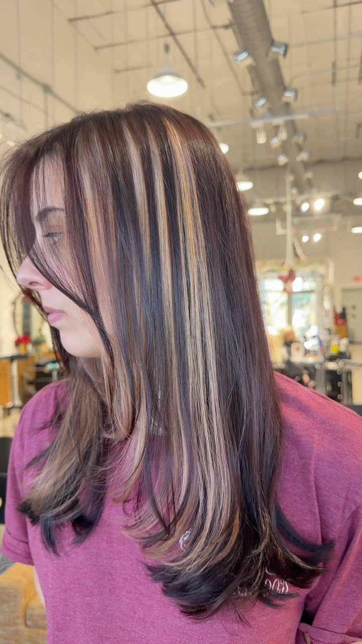 Types of Hair Colour: 12 Ideas, From Balayage to Copper 4 Woman with long dark brown hair and thick blonde color block highlights.