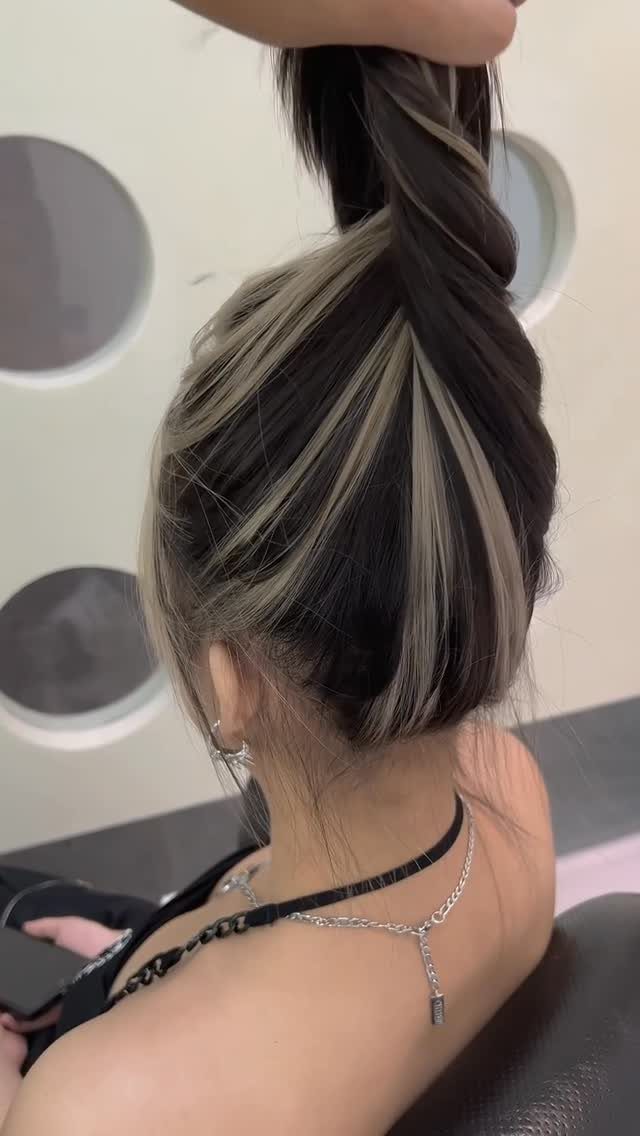 Types of Hair Colour: 12 Ideas, From Balayage to Copper 3 Blonde and dark brown hair streaks held up to show depth and contrast.