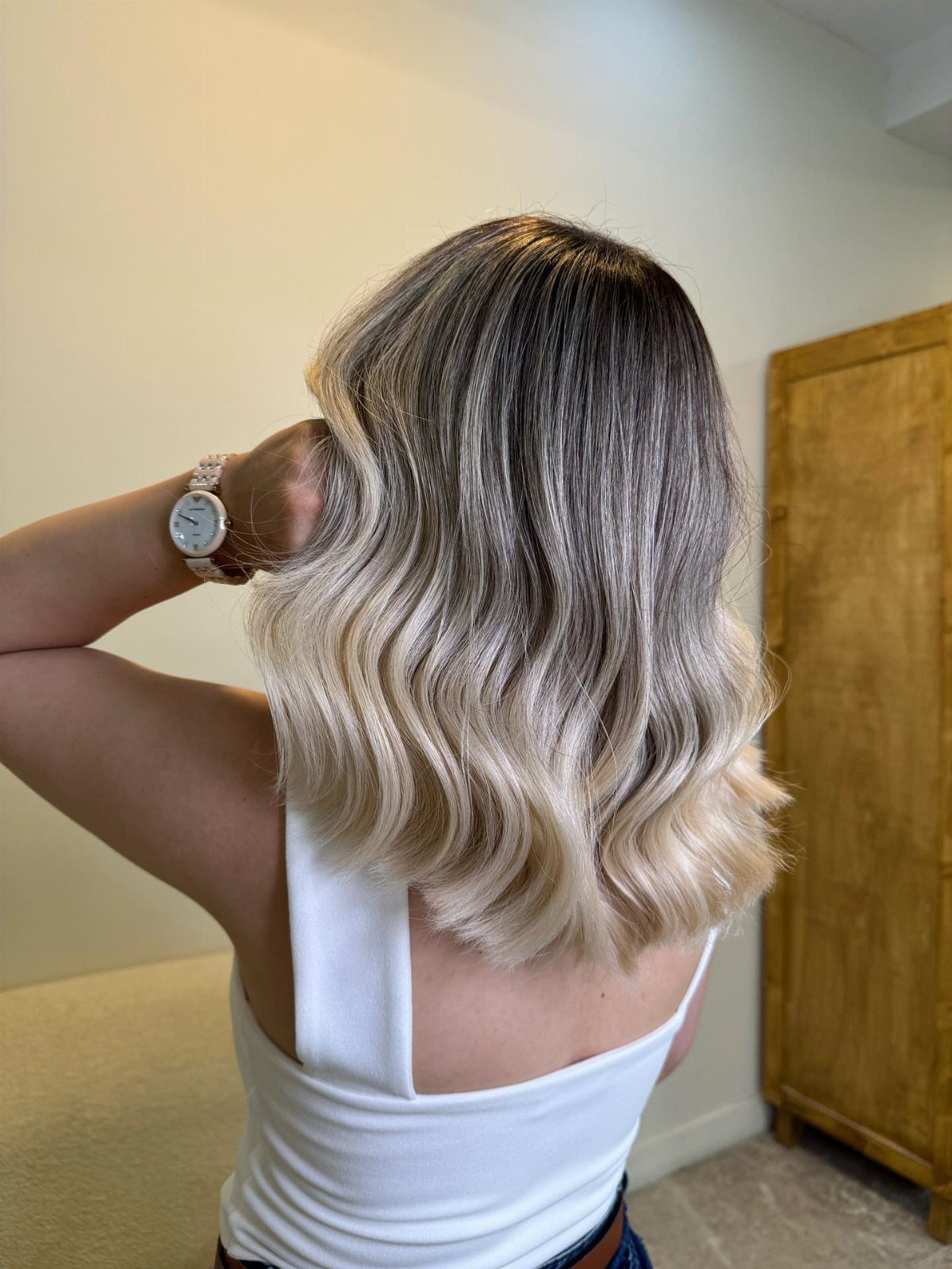 Types of Hair Colour: 12 Ideas, From Balayage to Copper 6 Wavy hair with a dark brown to light blonde ombré color gradient.