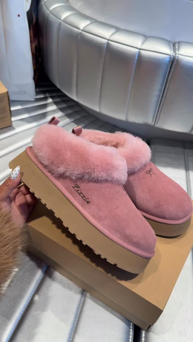 Uggs with Designs: 5 Ideas, From Leopard Print to Bows 5 Pink platform suede boots with fluffy collars and embroidered name on a box